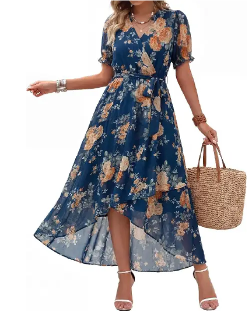 Model wearing a dark teal blue floral wrap dress with peach floral print, a tied waist, and an asymmetrical high-low hem.