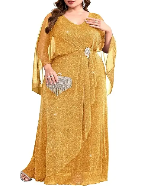 Metallic gold shimmering evening gown featuring a draped V-neckline, sheer cape sleeves, and a crystal brooch at the waist.