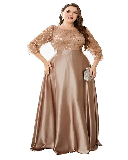 Rose gold three-quarter sleeve evening gown featuring a patterned sequined bodice, satin belt, and a smooth floor-length skirt.
