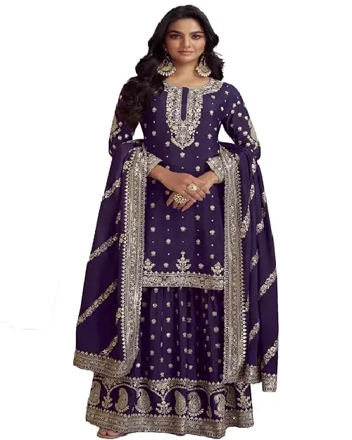 Royal purple sharara suit featuring intricate silver embroidery and a patterned matching dupatta.
