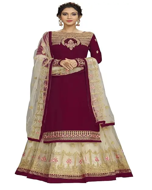 Wine-colored kurti paired with a cream and wine embroidered lehenga skirt and sheer dupatta.