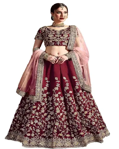 Deep maroon velvet lehenga choli set featuring heavy gold traditional embroidery, a heavily embellished skirt, and a soft pink net dupatta.