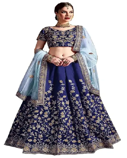 Royal blue velvet lehenga choli set featuring intricate gold embroidery, a matching heavily decorated skirt, and a light blue sheer dupatta.
