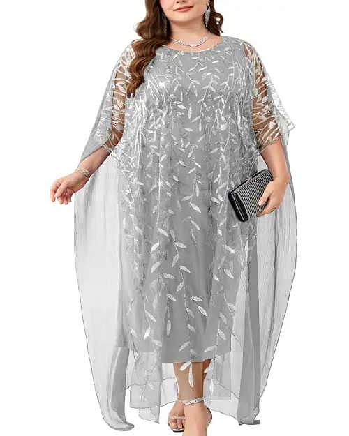 Silver-grey georgette plus size caftan dress featuring a layered sheer cape overlay with shimmering leaf embroidery and a matching clutch.