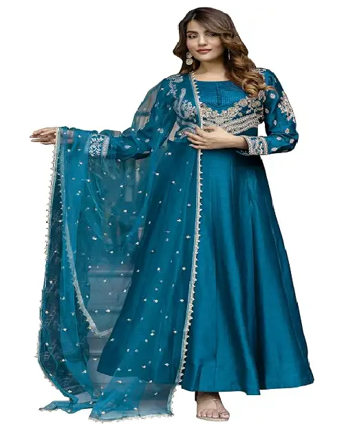 Teal blue georgette Anarkali gown accented with silver embroidery and a matching net dupatta.