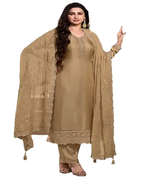Warm golden-beige georgette salwar suit featuring rich traditional thread embroidery on the yoke and hem, with a matching sheer dupatta.