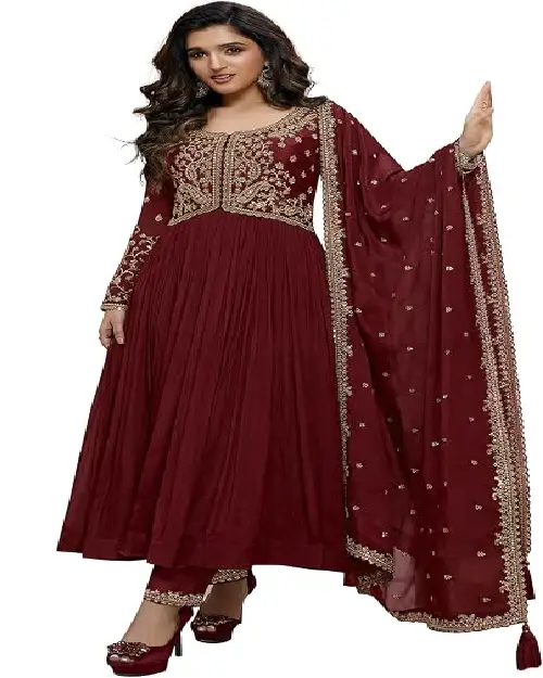 Deep maroon georgette Anarkali gown featuring rich gold yoke embroidery and a matching heavily embellished sheer dupatta.