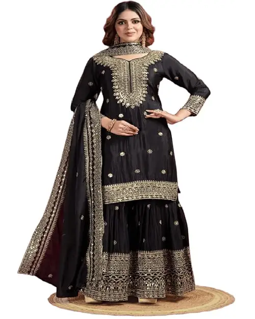Jet black silk sharara suit adorned with intricate gold zardozi embroidery on the yoke, hem, and matching dupatta.