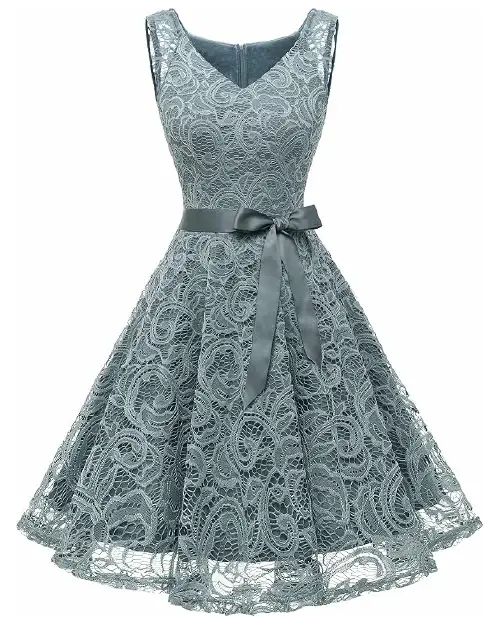 Dusty pink lace sheath cocktail dress featuring short cap sleeves, a sheer lace yoke, and a knee-length cut.