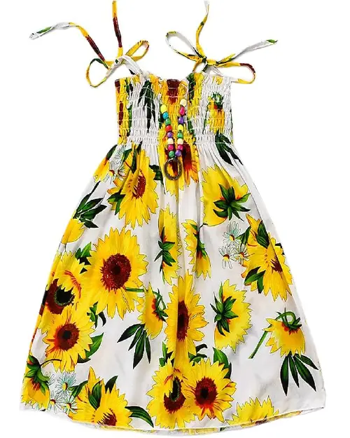 White sun dress featuring a vibrant yellow sunflower print, tie-up straps, and a beaded accent necklace