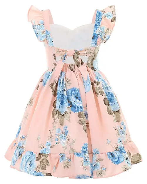 Peach-pink flora dress with a blue floral print, back bow tie, and ruffled cap sleeves.