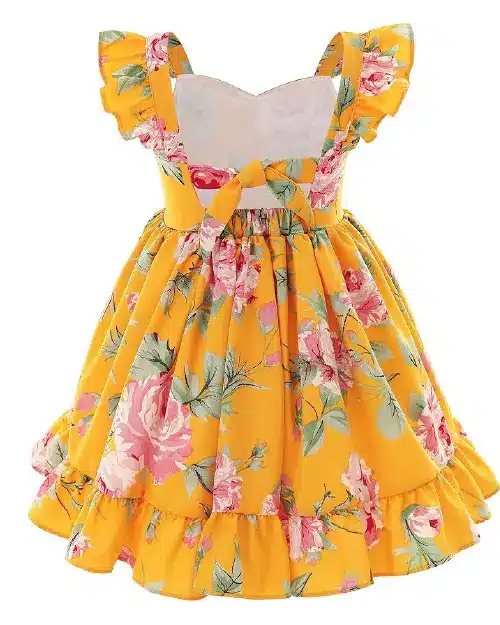 Bright yellow flora dress featuring a pink rose pattern, back tie-bow, and ruffled cap sleeves.