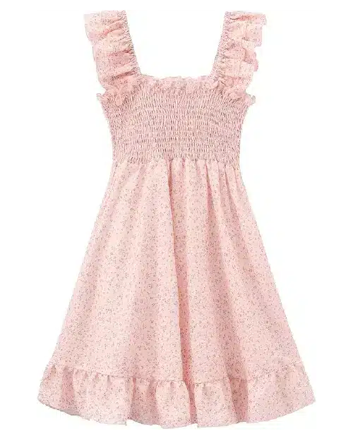 Light pink flora dress featuring an all-over tiny ditsy floral print, a smocked bodice, ruffled straps, and a ruffled hem.