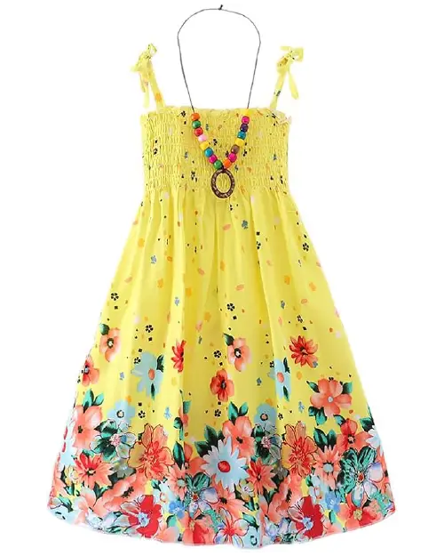 Bright yellow flora dress featuring a smocked bodice, strap bow ties, a colorful hem floral border, and a beaded necklace accessory.