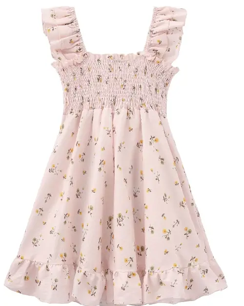 Light pink flora dress featuring tiny yellow and dark ditsy floral prints, a smocked bodice, ruffled straps, and a ruffled hem.