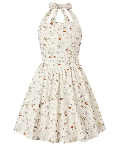 Cream-colored halter dress featuring a dainty neutral botanical print, pleated waistband, and a flared skater skirt with a top bow.