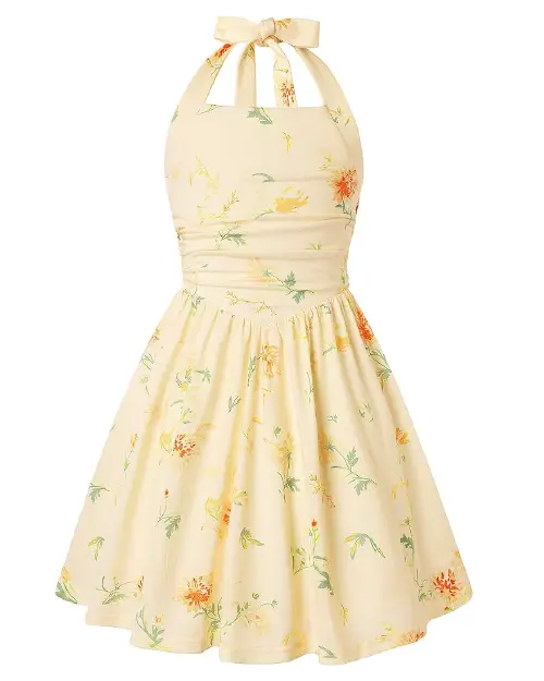 Pale yellow halter skater dress featuring a subtle yellow and orange floral print, pleated bodice, and a top neck bow.