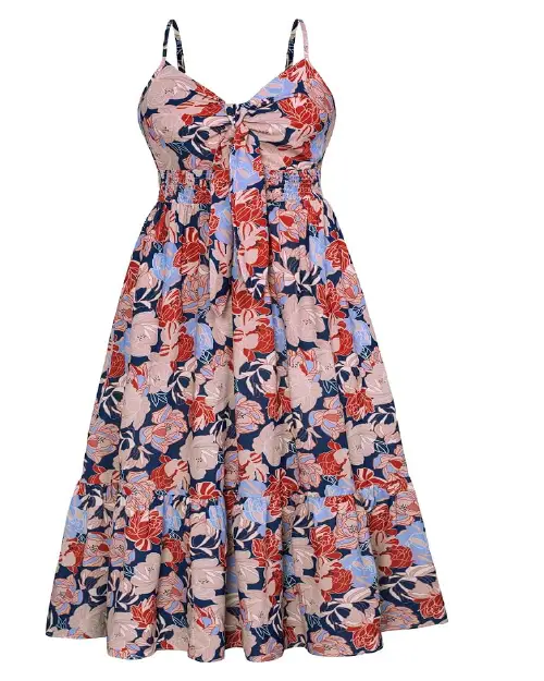 Pink and navy blue floral midi dress with spaghetti straps, a front tie bodice, a smocked waist, and a tiered ruffle hem.v