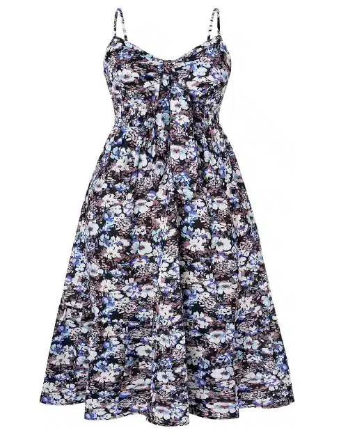 Blue, white, and purple floral print midi dress with spaghetti straps, a tie-front bodice, a smocked waist, and a tiered skirt.