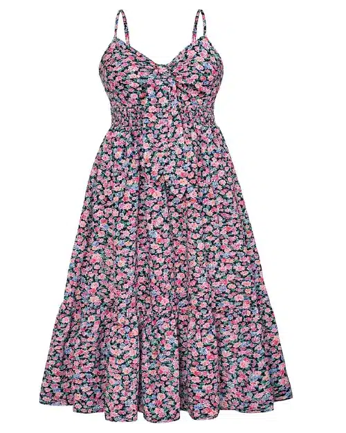 Pink, blue, and black ditsy floral print midi dress featuring spaghetti straps, a tie-front bodice, a smocked waist, and a tiered skirt.