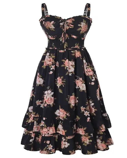 Black midi dress with a pink and white floral print, featuring wide straps, a smocked bodice with a front tie, and a tiered ruffle hem.