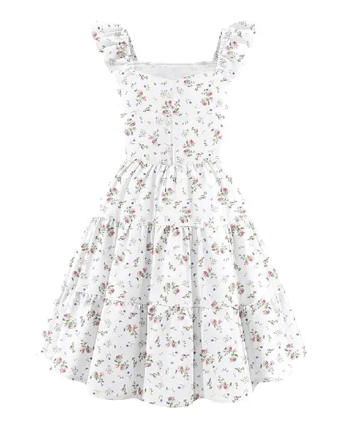White flora dress featuring a delicate multi-color miniature floral print and ruffled cap sleeves.