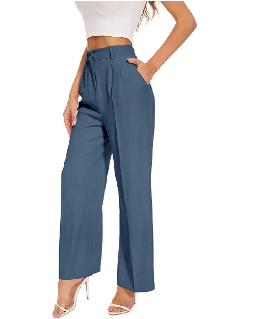 A person wearing slate blue high-waisted wide-leg work pants for women featuring front pleats, belt loops, and side pockets.