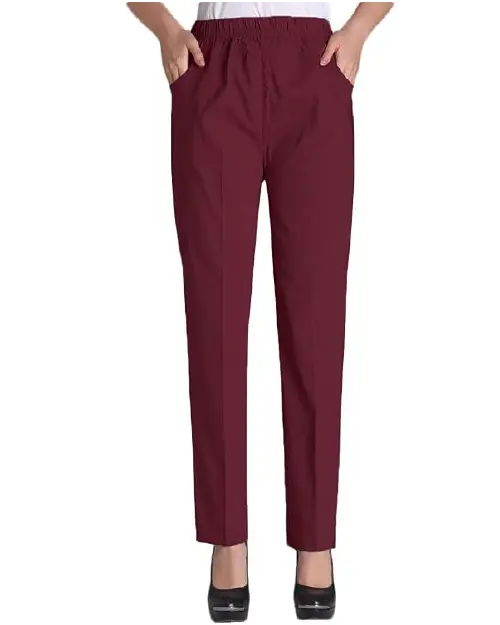 A person wearing deep burgundy straight-leg work pants for women featuring an elastic waistband and side pockets.
