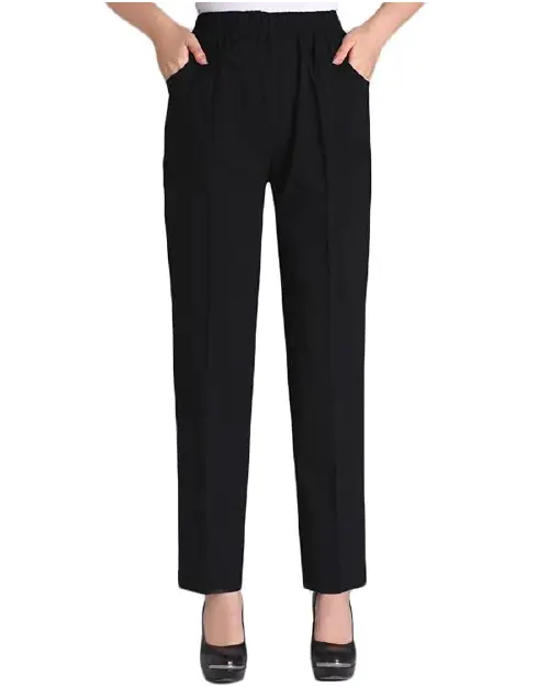 Black relaxed-fit office trousers for women featuring an elastic waistband, front creases, and convenient side pockets, paired with black heels.