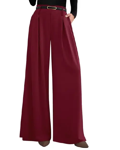 Burgundy formal wide-leg trousers for women featuring front pleats, a high waist, belt loops with a black belt, and side pockets, paired with dark brown heels.