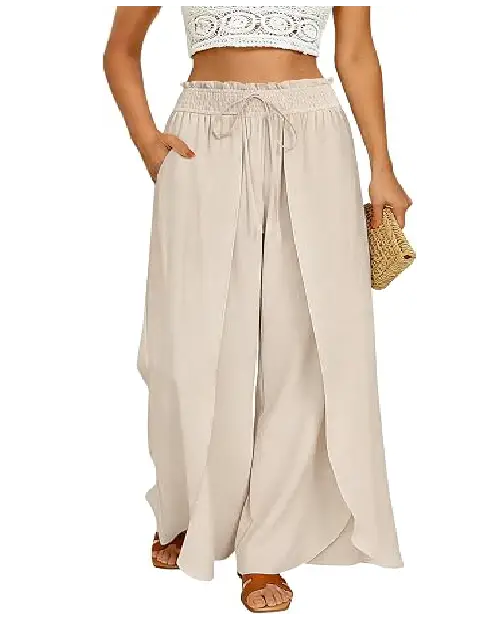 Beige layered wide-leg pants for women featuring an overlay wrap design, smocked elastic drawstring waistband, and side pockets, paired with sandals.
