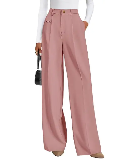 Dusty pink formal wide-leg trousers for women featuring structured waist details, front pleats, and a clean professional cut, paired with nude heels.