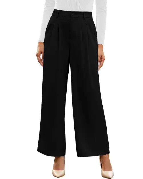Black formal wide-leg trousers for women featuring front pleats, a high-waisted fit, and belt loops, paired with a white top and beige heels.