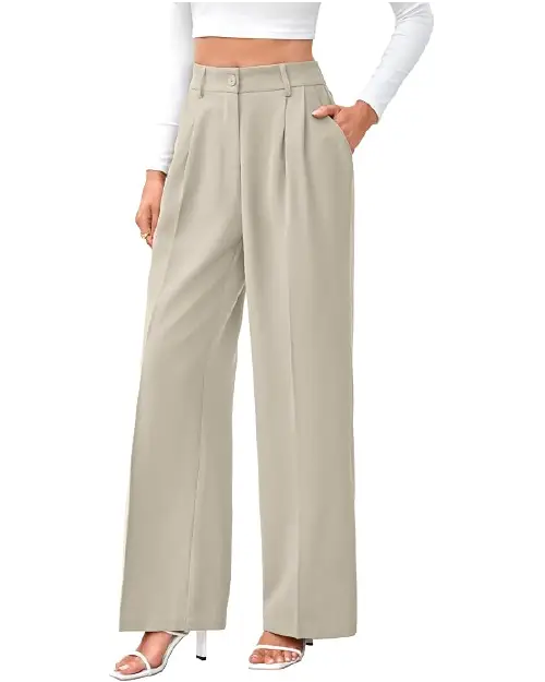 A person wearing stone-colored high-waisted wide-leg work pants for women with front pleats and side pockets, paired with white heeled sandals.